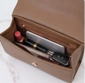 brown ladies handbag interior zipper compartment