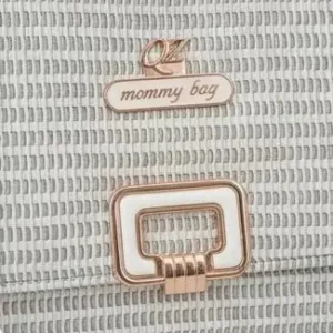 green white textured handbag front lock detail