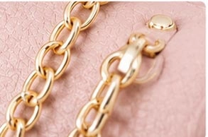 pink ladies handbag gold chain hardware detail