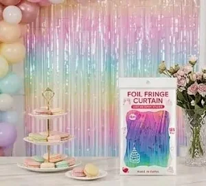 Rainbow foil fringe curtain party backdrop