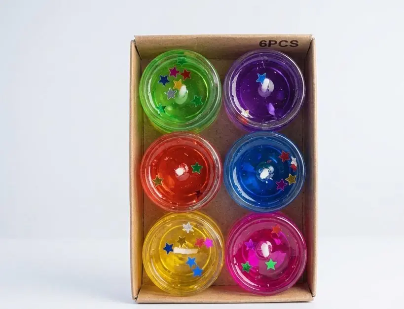 Colorful Star Glitter Jelly Candles Set (6 Pcs) Box of 6 colorful transparent star glitter jelly candles for home decoration at Sabuj Hub