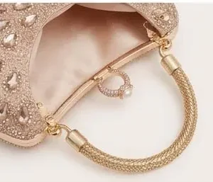 sabuj hub golden clutch handle and pearl clasp