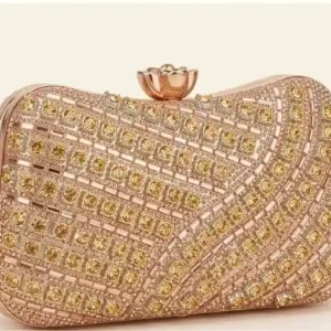 Gorgeous golden crystal embellished party clutch bag with flower clasp closure at Sabuj Hub