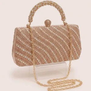 Gorgeous golden crystal and pearl embellished party clutch bag with matching handle and chain at Sabuj Hub