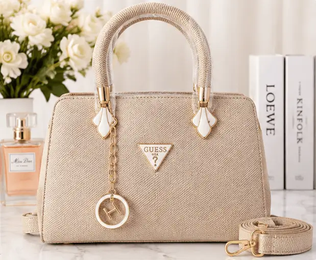 Sabuj Hub Off-White Textured Handbag Sabuj.Hub elegant off-white textured handbag with top handles and charm strap