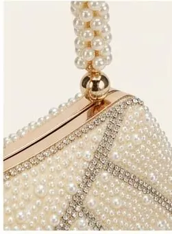sabuj hub pearl handle and crystal detailing closeup. sabuj hub pearl handle and crystal detailing closeup.