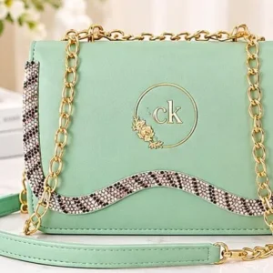 Stylish mint green ladies handbag with gold chain