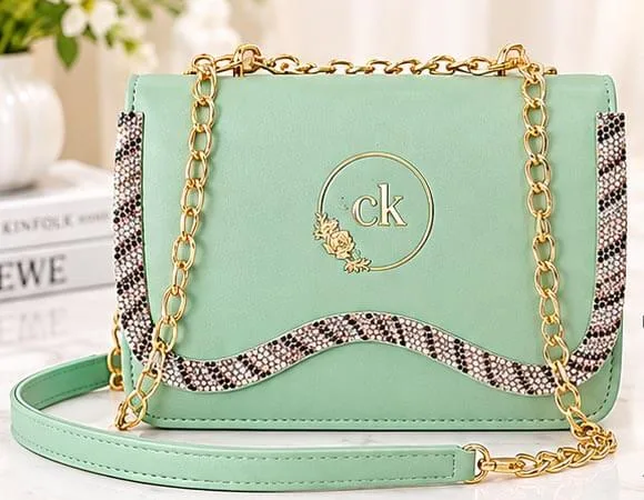 stylish mint green ladies handbag with gold chain Stylish mint green ladies handbag with gold chain