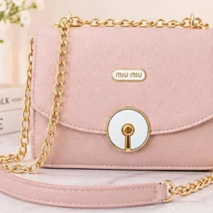 Stylish pink ladies handbag with gold chain