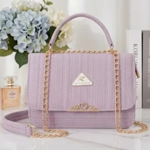 Stylish purple textured ladies handbag with gold chain and Royal Chaals logo