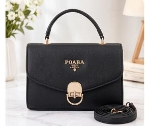 Stylish black ladies top-handle handbag with gold lock