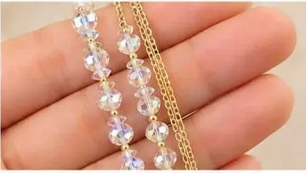 clear transparent crystal beaded necklace hand held view clear transparent crystal beaded necklace hand held view