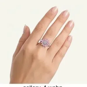 Rose Gold Sunflower Shaped Ring with Pink Petal Crystals and White Center Cluster on Female Hand
