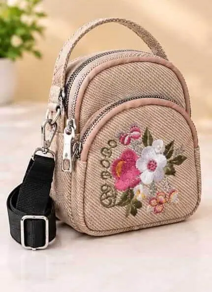 sabuj hub beige floral embroidered mini bag front view sabuj hub beige floral embroidered mini bag front view