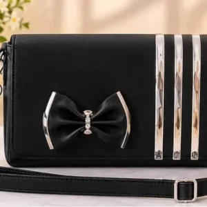 Stylish black crossbody shoulder bag with decorative bow and silver stripe accents at Sabuj Hub