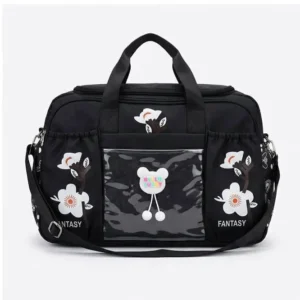 Front view of Sabuj Hub black Fantasy print travel and duffle bag with teddy bear patch