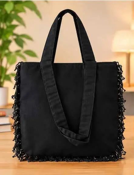 sabuj hub black fringe tote bag front view. sabuj hub black fringe tote bag front view.