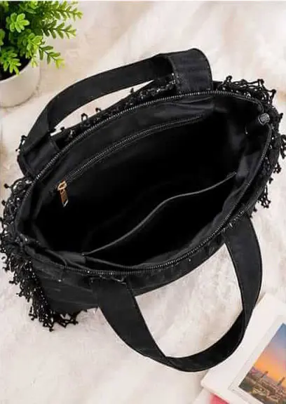 sabuj hub black fringe tote bag interior view. sabuj hub black fringe tote bag interior view.