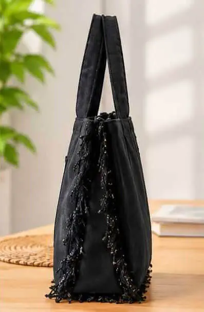 sabuj hub black fringe tote bag side profile sabuj hub black fringe tote bag side profile