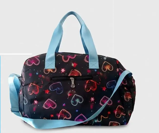 Black Heart and Star Print Travel Bag Front View Sabuj Hub Front view of Sabuj Hub black travel and duffle bag featuring glowing heart and star prints with light blue straps