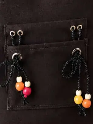 sabuj hub black tote bag beaded pocket closeup sabuj hub black tote bag beaded pocket closeup
