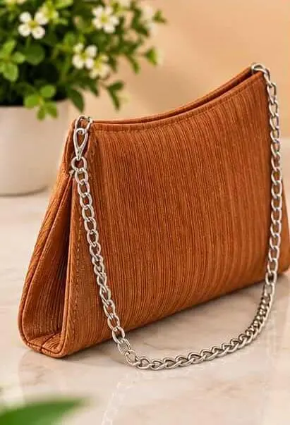 sabuj hub brown pleated shoulder bag side view sabuj hub brown pleated shoulder bag side view