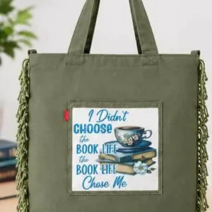 Front view of Sabuj Hub olive green canvas tote bag featuring book life quote print and side fringes detail