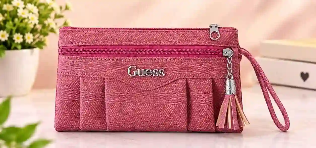 Pink Textured Long Wallet and Purse Stylish pink textured long wallet and clutch purse with zipper pockets and wrist strap at Sabuj Hub