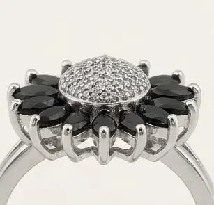 silver black white sunflower crystal ring side macro silver black white sunflower crystal ring side macro