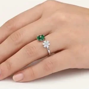 Home Silver Open Bypass Ring Featuring Emerald Green and White Crystal Flowers Displayed on Female Hand